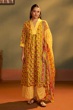 NIHARA Women’s Yellow Cotton Blend Printed Flared Kurta with Printed Pant & Chanderi Printed Dupatta