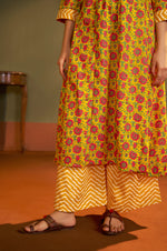 NIHARA Women’s Yellow Cotton Blend Printed Flared Kurta with Printed Pant & Chanderi Printed Dupatta
